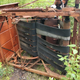 Yup, it IS! An Allis-Chalmers Roto-Baler! The first commercial round baler. Introduced in 1947, production ended in 1960. This looks restorable...